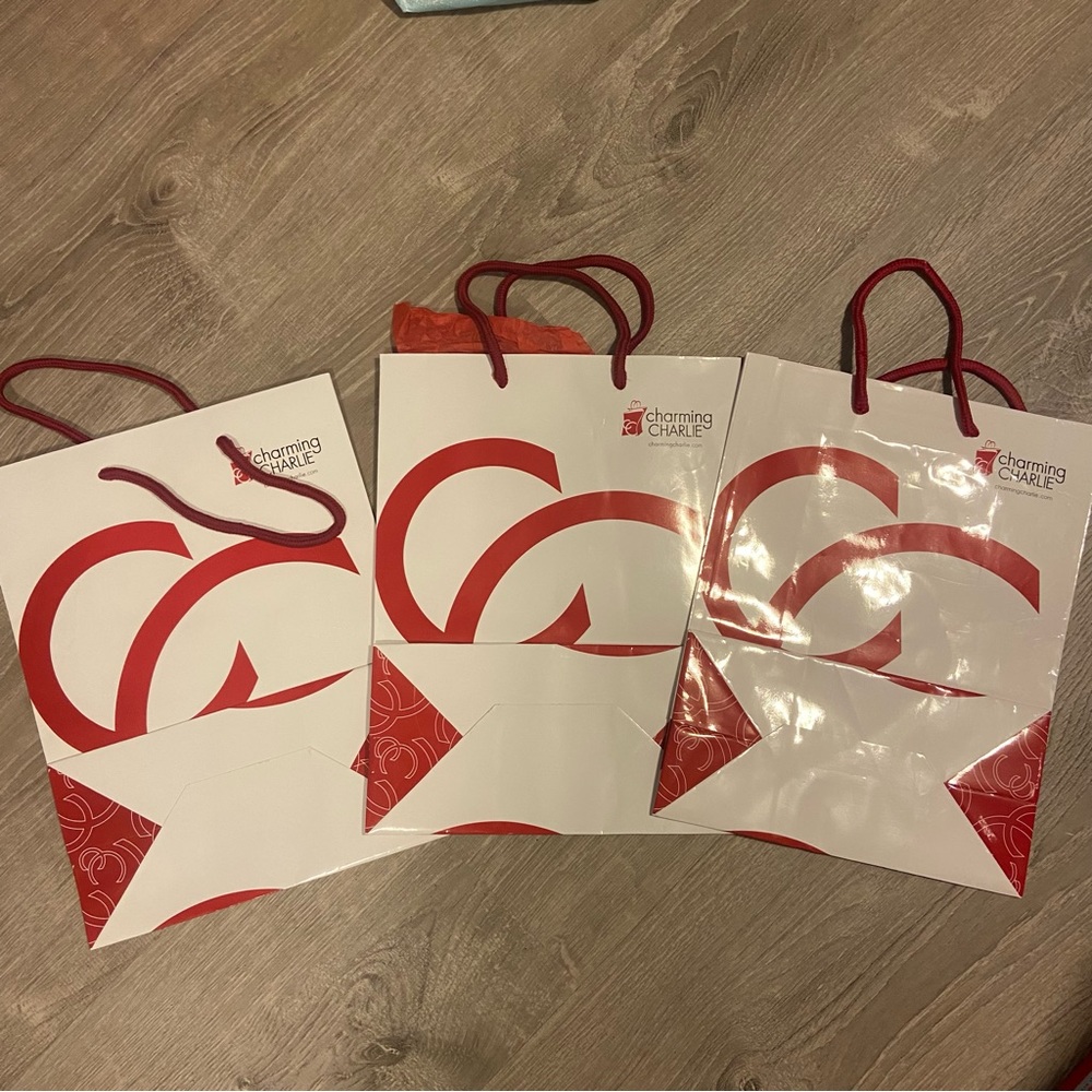 3 Charming Charlie bags free with $15 purchase